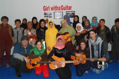 Girl with Guitar- Lanny Cordola aka the Miraculous Love Kids
